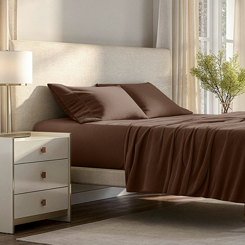 Bed styled with dark brown Polar Fleece Sheet Set, closer view