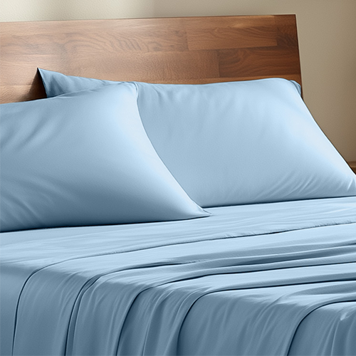 Bed with a light blue bamboo sheet set