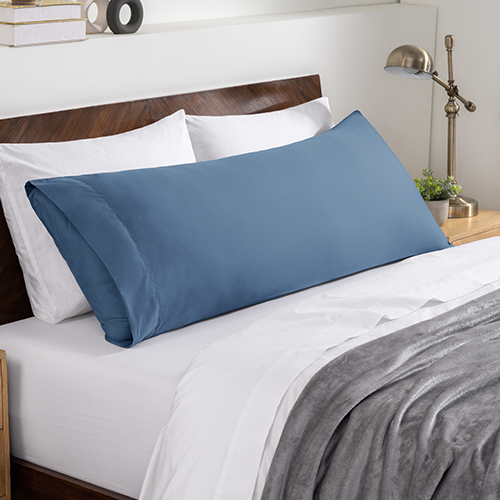 Bed with slate blue Ultra Soft Body Pillowcase and gray bedding