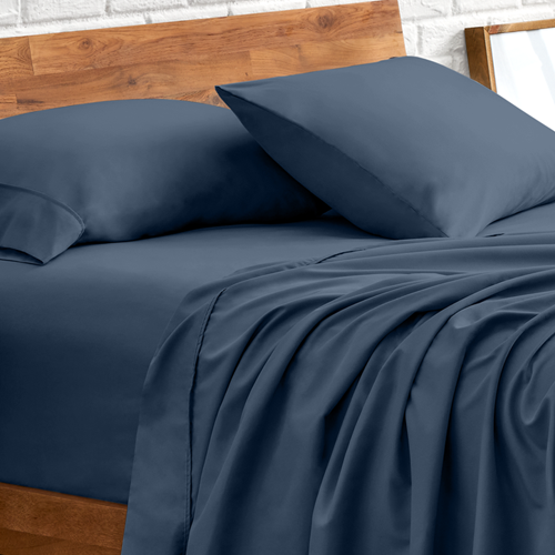 Bed styled with dark navy Ultra Soft Darks and Bolds Soft Sheet Set, closer view