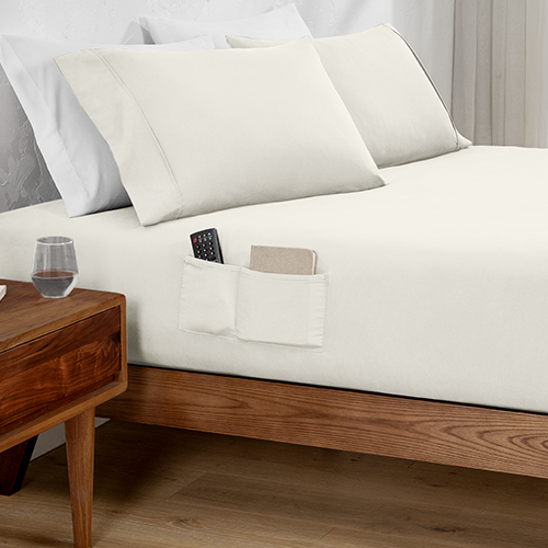 Bed with white Ultra Soft Dual Side Pocket Fitted Sheet and wood bed frame