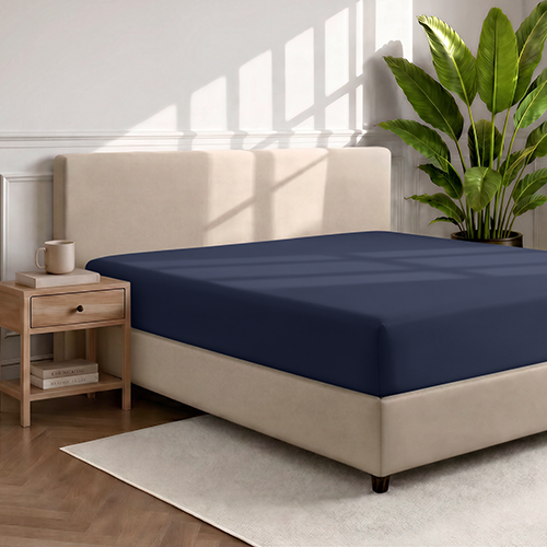 Bed with navy blue Ultra Soft Fitted Sheet