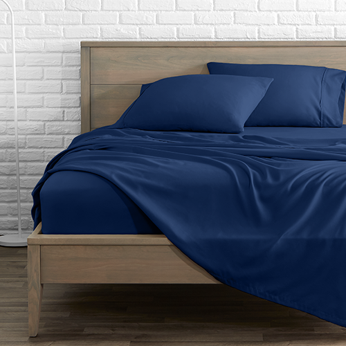 Bed with navy blue Ultra Soft Flat Sheet