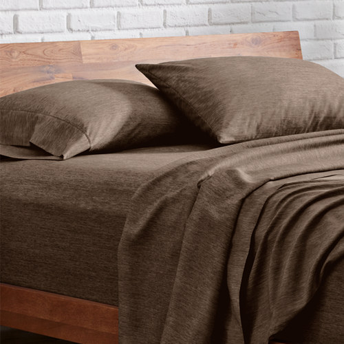 Bed styled with brown heathered Ultra Soft Heather Sheet Set, closeup