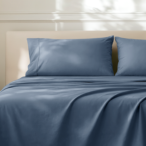 Bed with dark blue Ultra Soft Open End Pillowcase Set, closer view