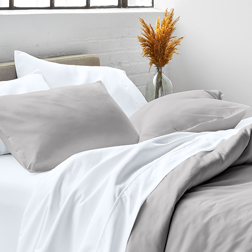 Bed with white Ultra Soft Pillow Sham Set, closeup