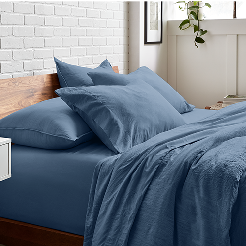 Bed styled with denim blue Ultra Soft Washed Bedding Bundle