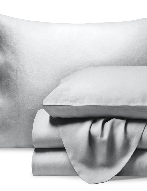 A neatly folded set of linen sheets