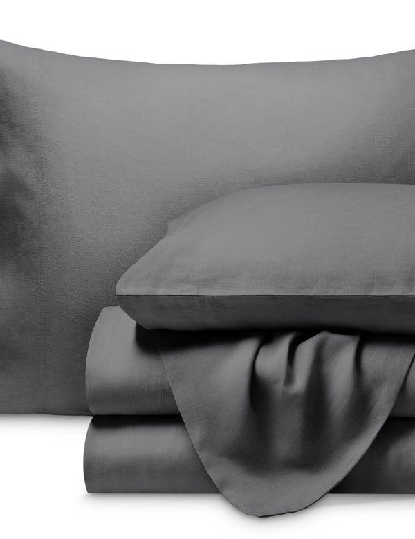 A neatly folded set of linen sheets