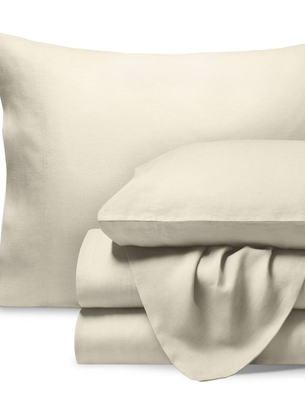 A neatly folded set of linen sheets
