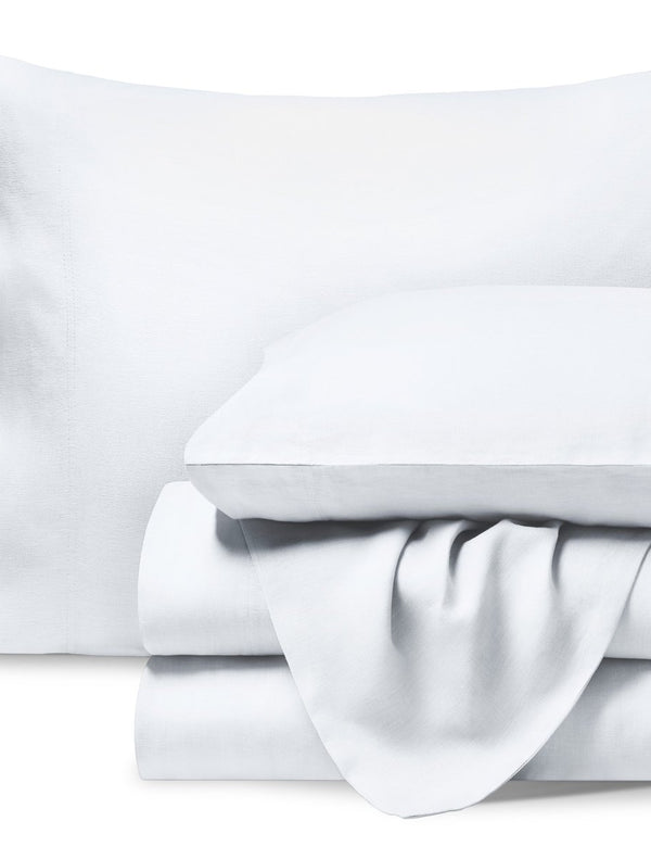 A neatly folded set of linen sheets