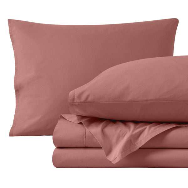 Percale sheets and pillowcases on a white background