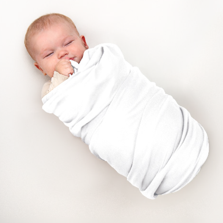 Baby swaddled in a white cotton flannel blanket