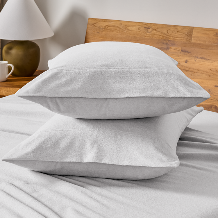 Close-up of white flannel pillowcase fabric