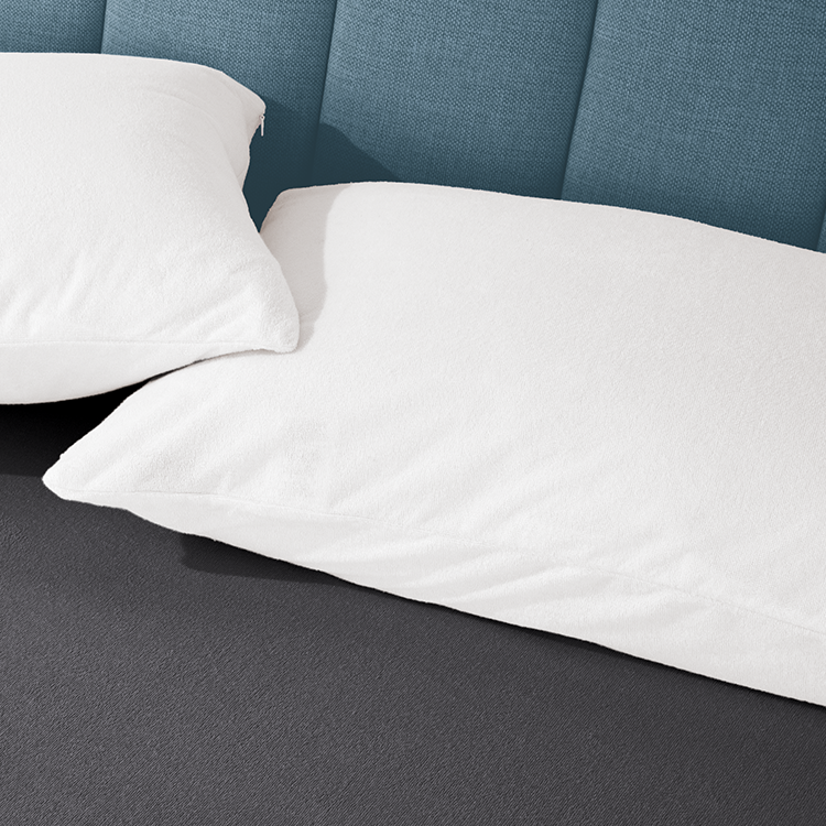 Pillow covered with light blue Cotton Terry Pillow Protector, closeup