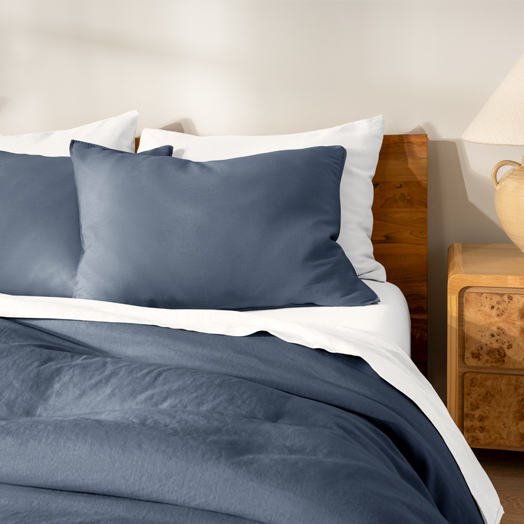 Bed styled with navy blue European Linen Duvet Cover Set