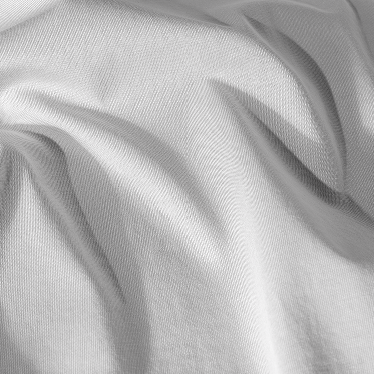 Closeup of light gray Organic Cotton Jersey Bedding Bundle fabric texture