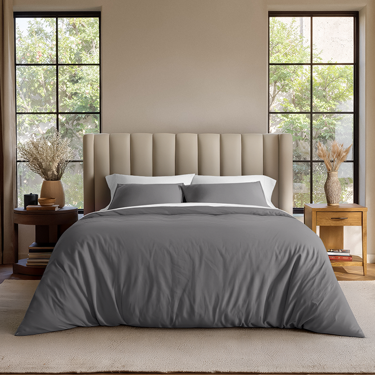 Bed styled with dark gray Organic Cotton Jersey Duvet Cover Sham Set in a bedroom