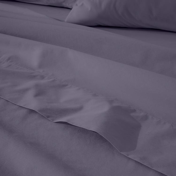 Closeup of dark navy Organic Cotton Percale Bedding Bundle fabric texture