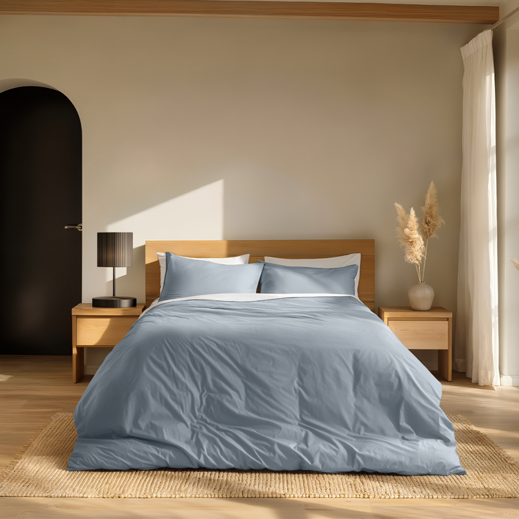 Bed styled with light blue Organic Cotton Percale Duvet Cover Set