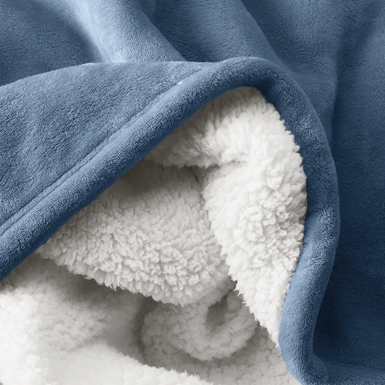Closeup of navy blue and white Sherpa Blanket fabric texture