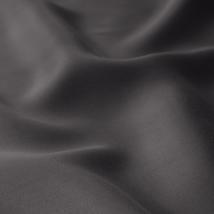 Closeup of dark gray TENCEL Bedding Bundle fabric texture