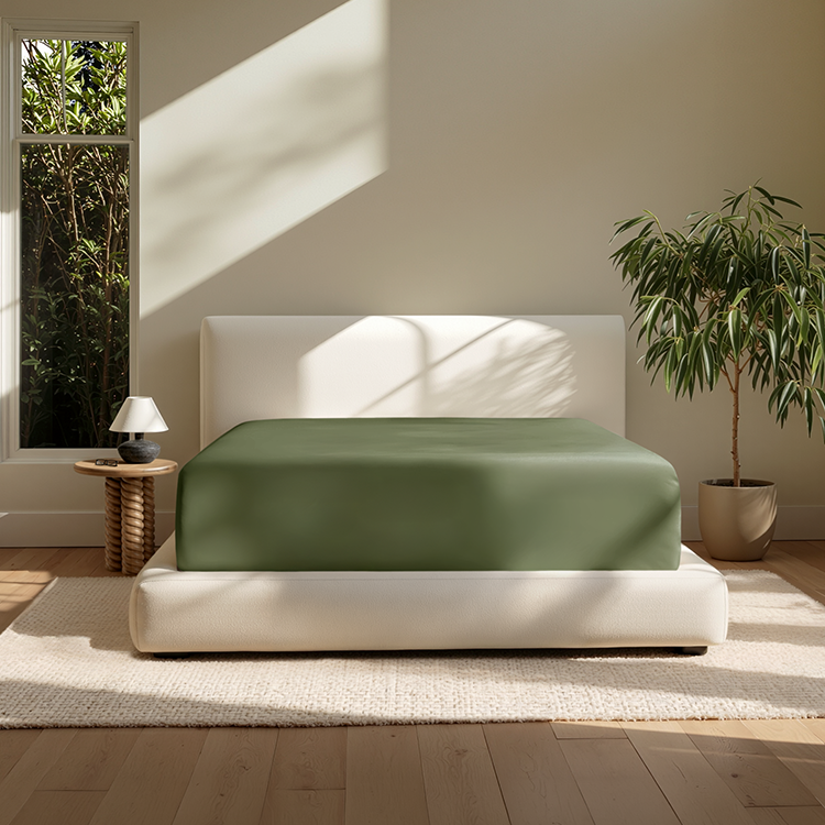 Bed styled with sage green Ultra Soft 22 Inch Pocket Fitted Sheet