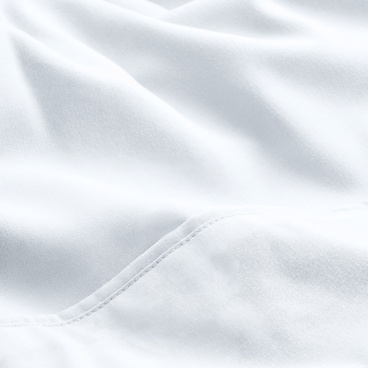 Closeup of white Ultra Soft Dual Side Pocket Sheet Set fabric texture