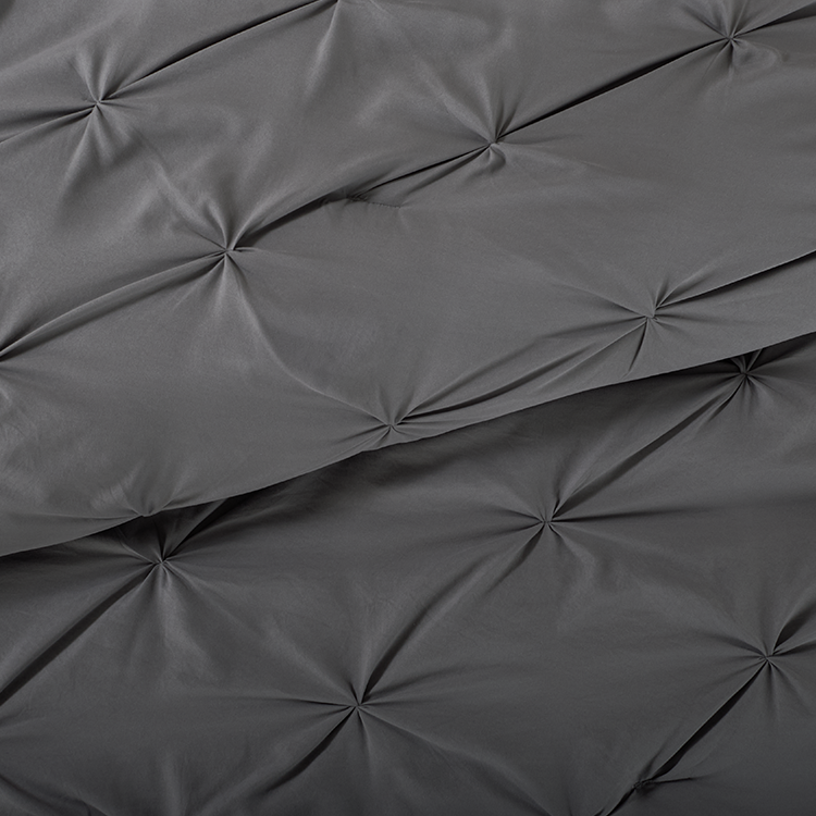 Closeup of dark gray Ultra Soft Pintuck Comforter Set fabric texture