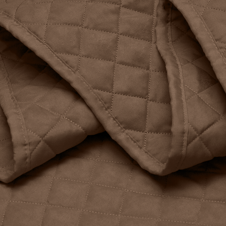 Closeup of dark brown quilted Ultra Soft Quilt Set fabric texture