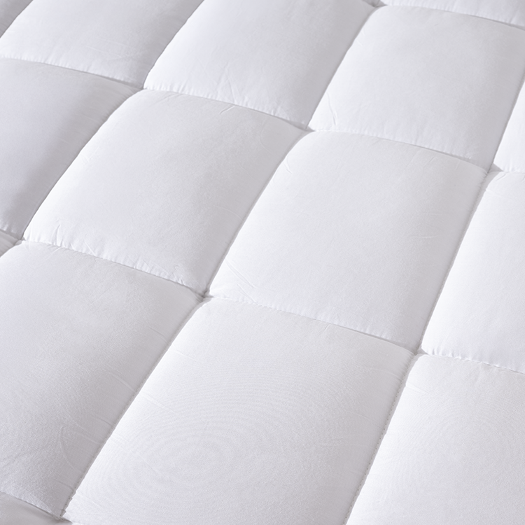 Closeup of white Cotton Top Mattress Pad quilted texture