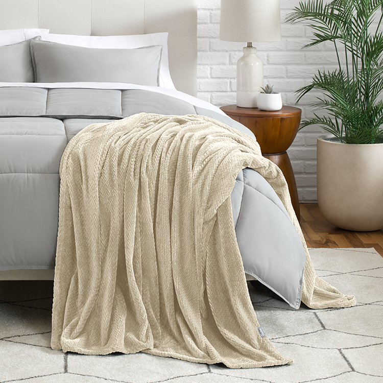 Bed with cream Microplush Chevron Blanket