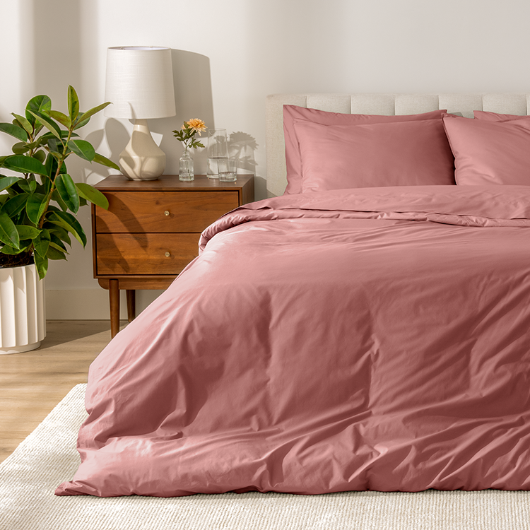 Bed styled with pink Organic Cotton Percale Bedding Bundle