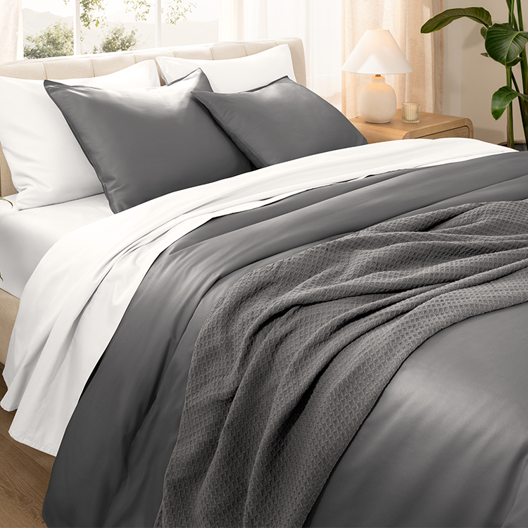 Bed styled with dark gray Organic Cotton Sateen Bedding Bundle