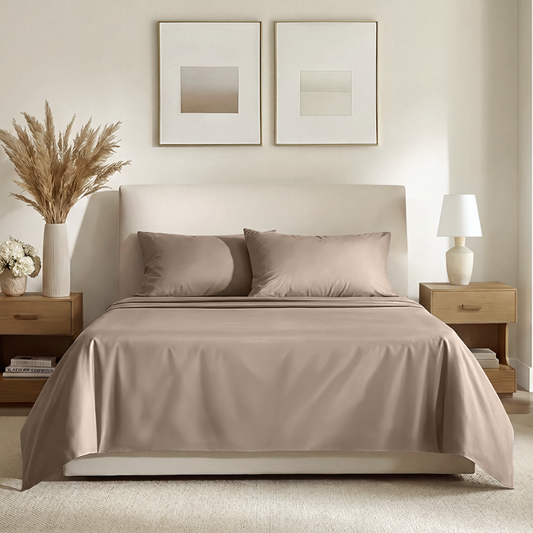 Bed styled with taupe Organic Cotton Sateen Sheet Set in a minimalist bedroom