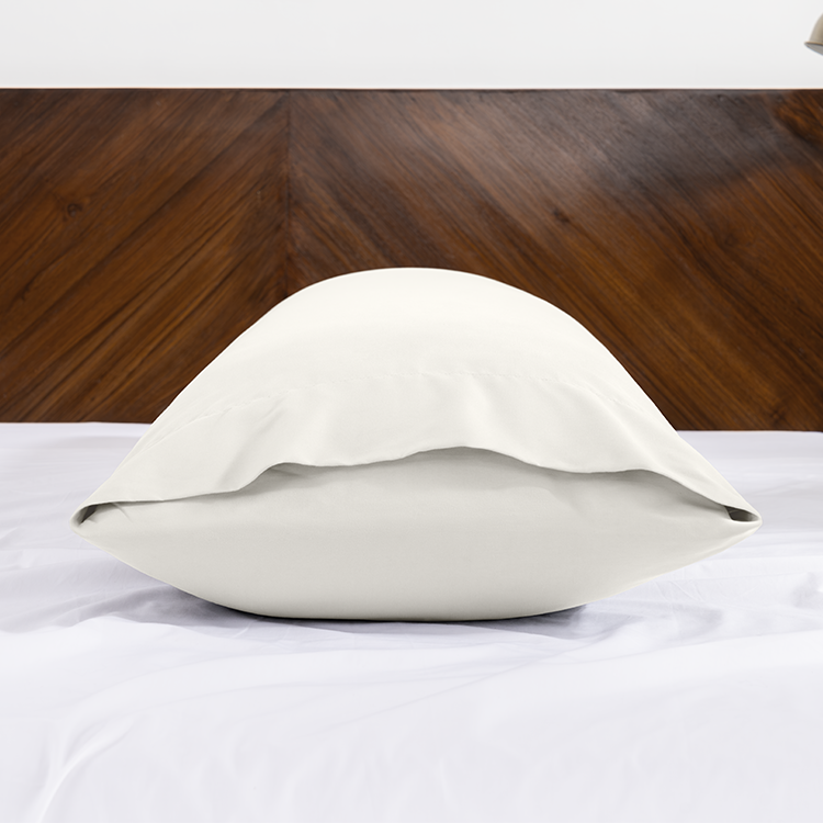 White Ultra Soft Body Pillowcase on a bed, closeup
