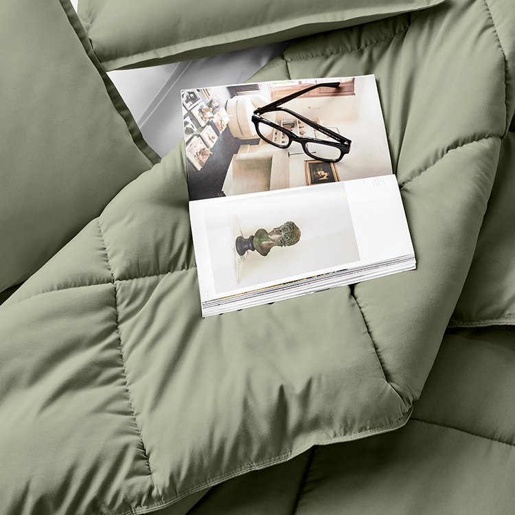 Closeup of dark olive green Ultra Soft Box Stitch Comforter Set showing box-stitch detail