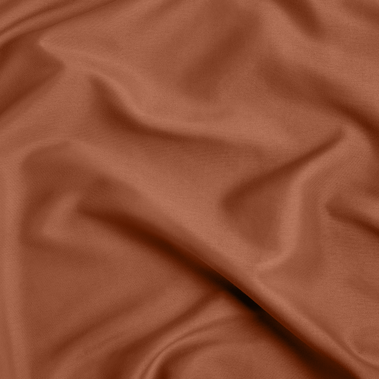 Closeup of rust orange Ultra Soft Darks and Bolds Soft Sheet Set fabric
