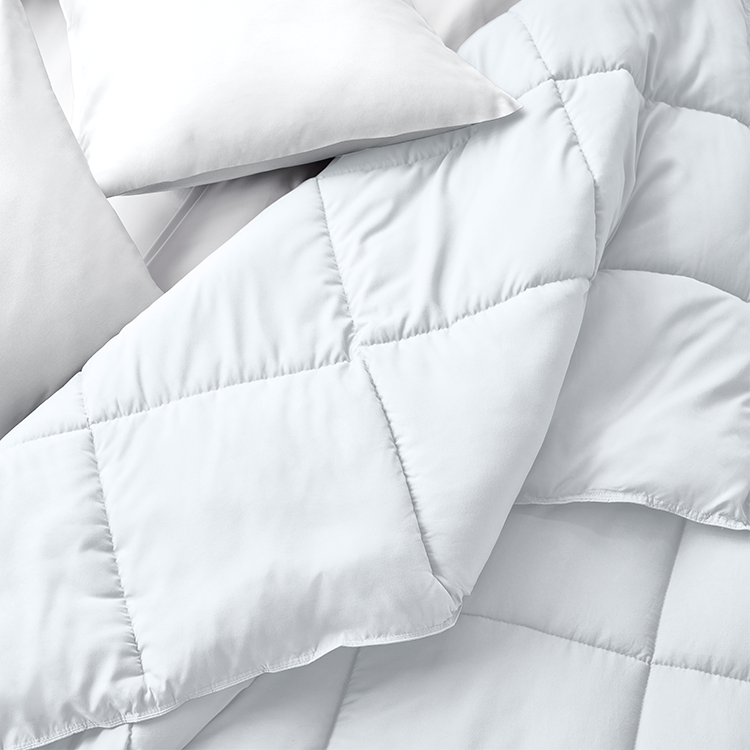 Closeup of white fluffy Ultra Soft Duvet Insert corner