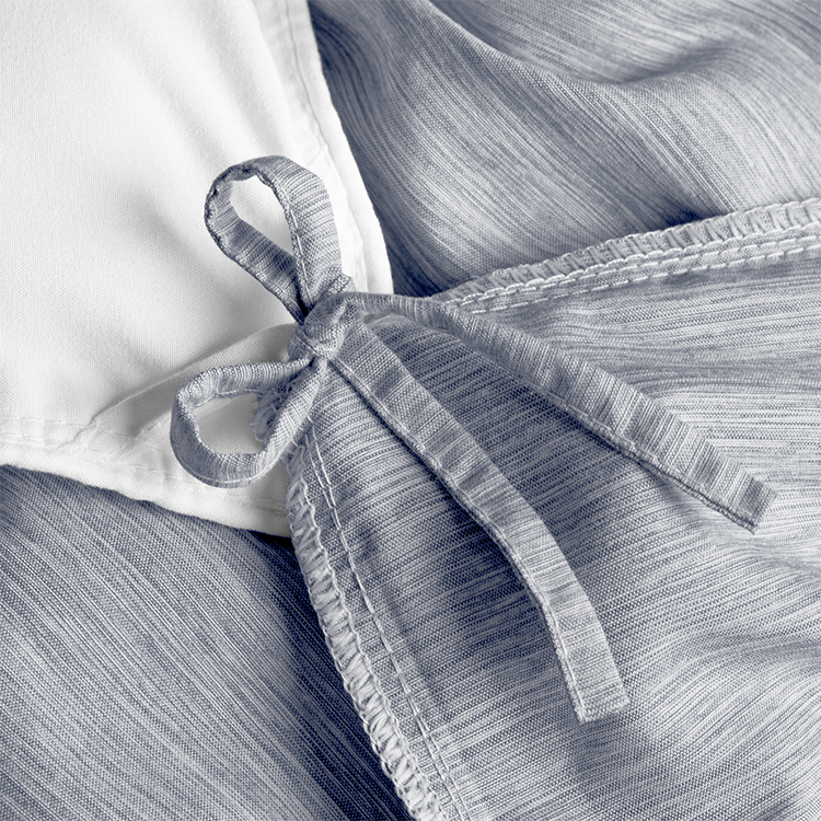 Closeup of gray Ultra Soft Heather Duvet Cover Set fabric with tie closure