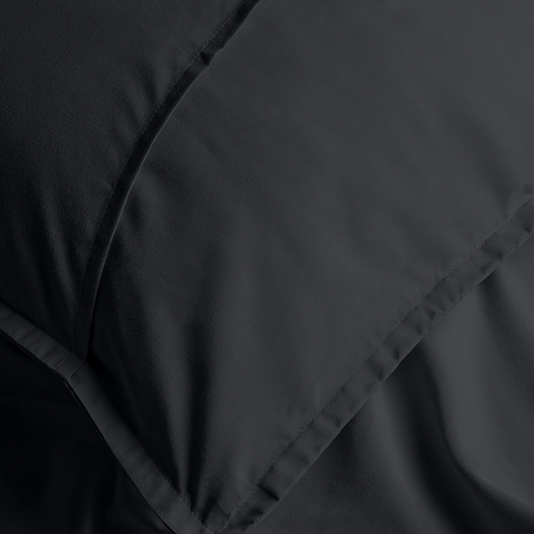 Closeup of black Ultra Soft Pillow Sham Set fabric