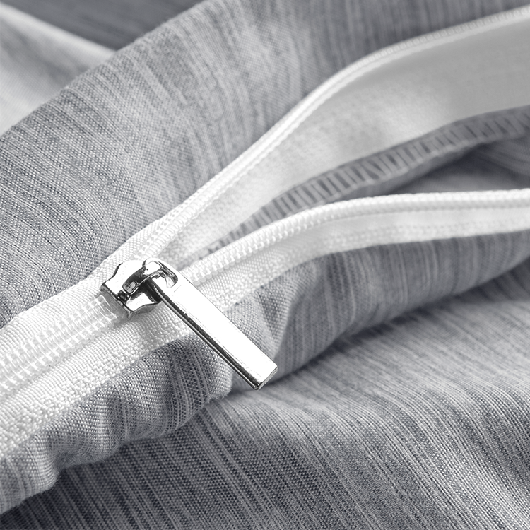 Closeup of gray Ultra Soft Heather Duvet Cover Set fabric with zipper closure