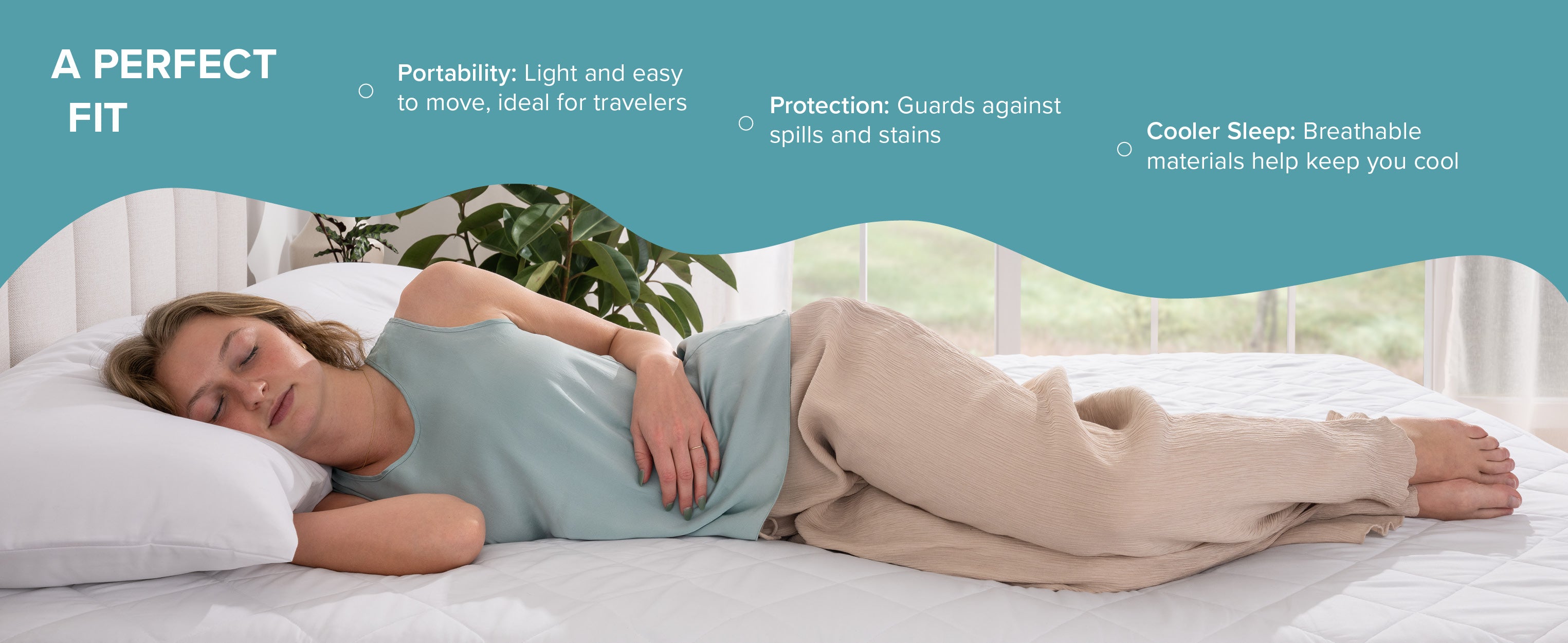 woman laying sideways on bed with quilted mattress pad on it