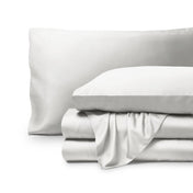 Bamboo pillowcases and sheets set on a white background