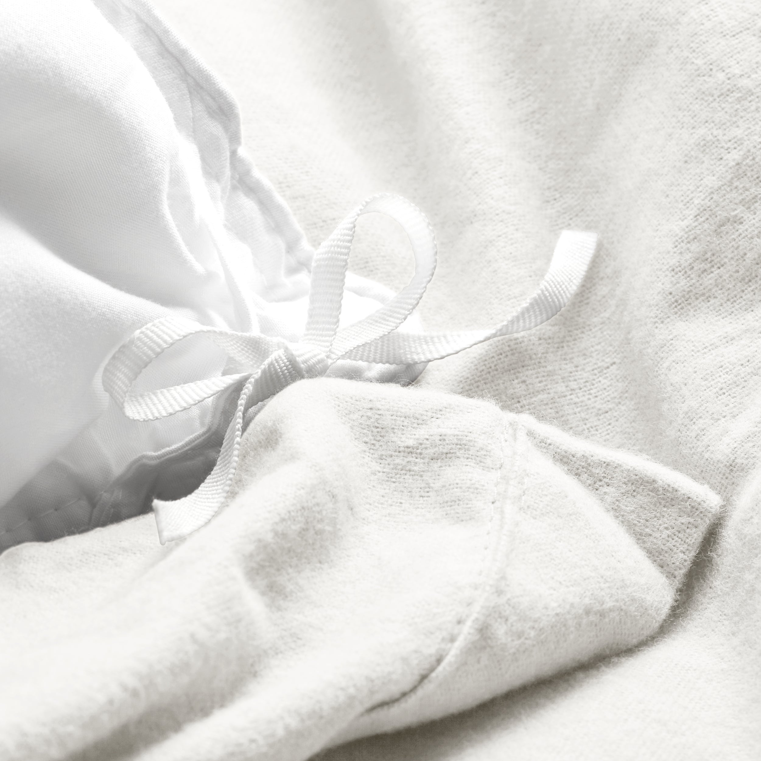 Close-up of the ties on a flannel duvet cover