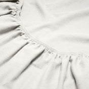 Close-up of a flannel fitted sheet with gathered elastic