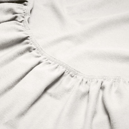 Close-up of a flannel fitted sheet with gathered elastic