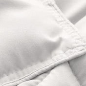 Close-up of comforter fabric with stitching detail