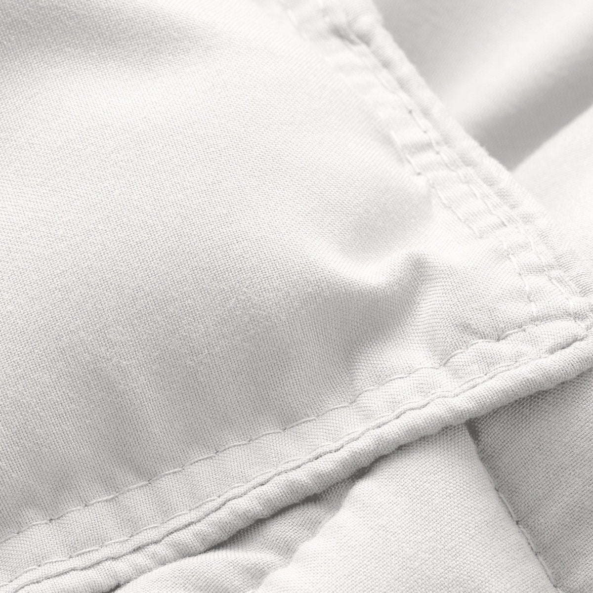 Close-up of comforter fabric with stitching detail