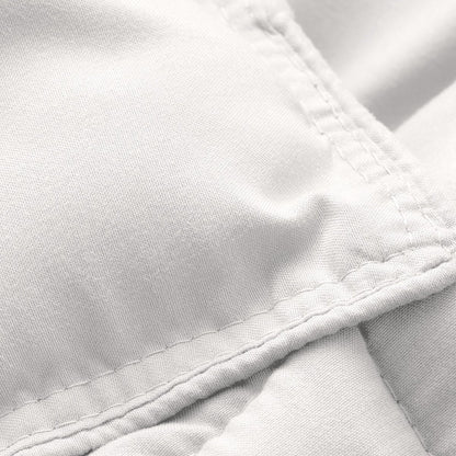 Close-up of comforter fabric with stitching detail